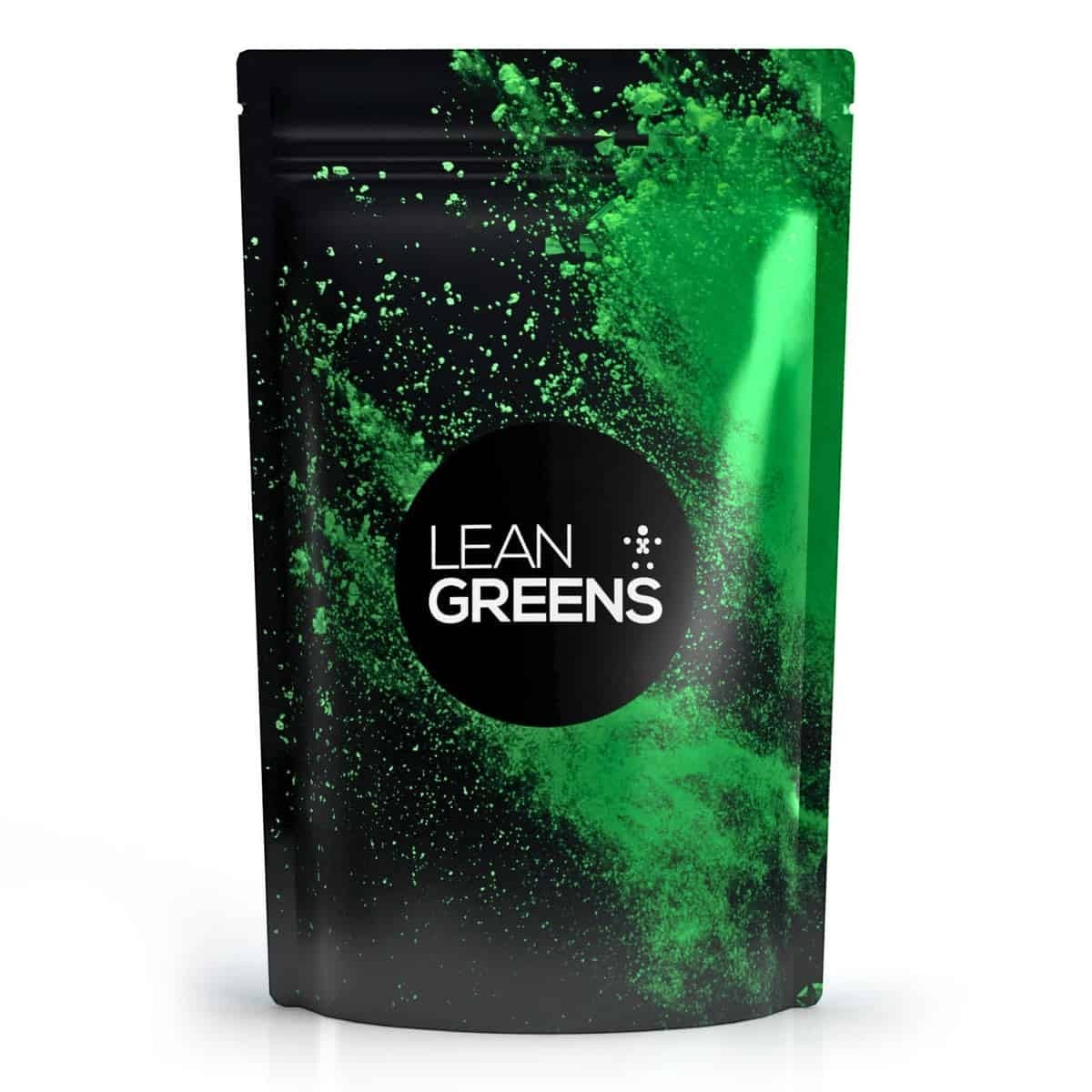 W/Lean Greens super greens powder in a black pouch with green powder explosion effect. Supports daily nutrition and busy lifestyles.