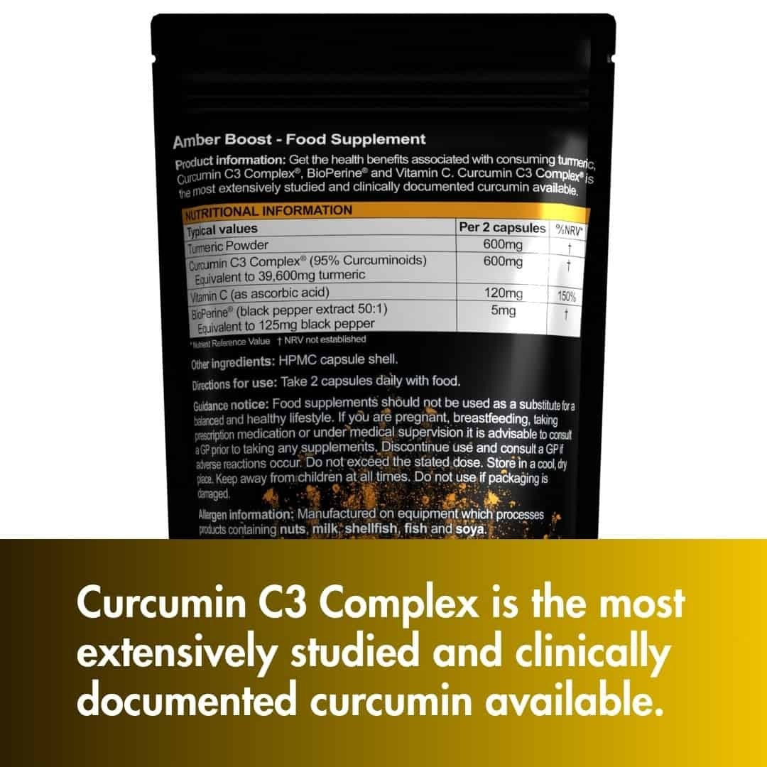 W/end Amber Boost turmeric and curcumin supplement capsules with vitamin C and black pepper extract. Food supplement.