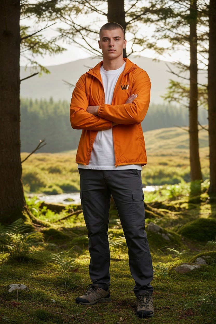 W/end windbreaker jacket in hot ember orange, lightweight synthetic material, zip fastening, and hood.
