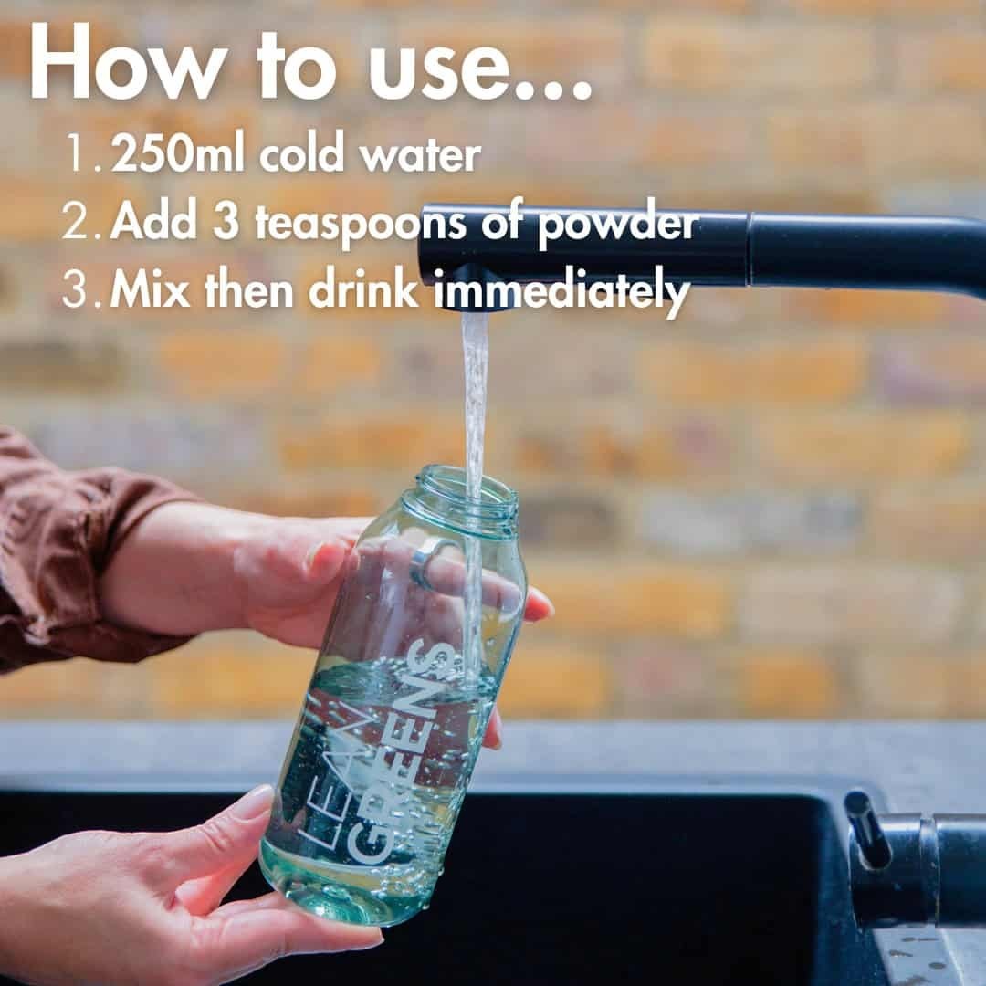 W/end Lean Greens super greens powder being mixed with water in a branded bottle. Easy daily nutrition.