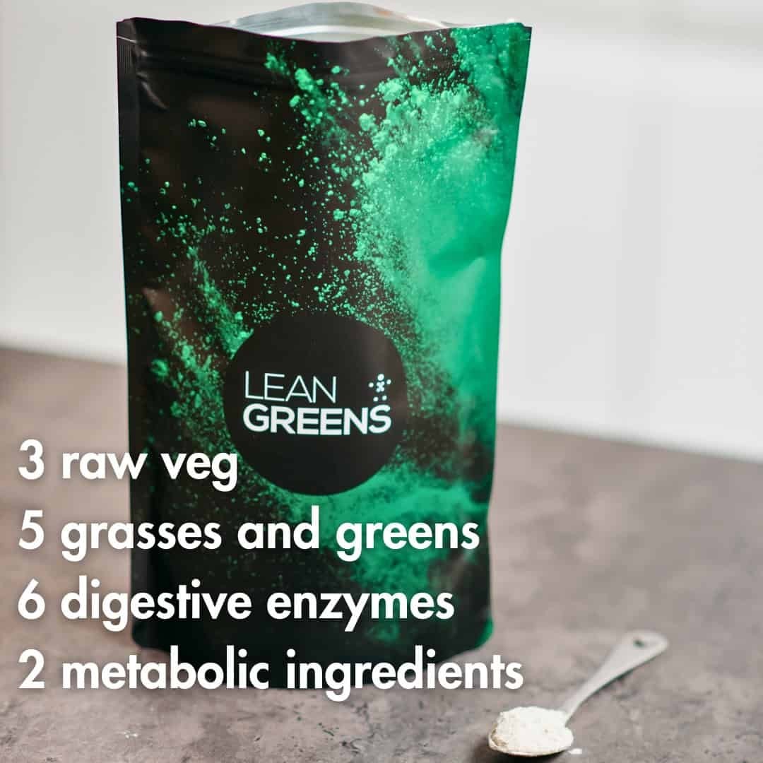 W/end Lean Greens super greens powder in a black pouch with green powder explosion graphic. Includes 3 raw veg, 5 grasses and greens, 6 digestive enzymes, 2 metabolic ingredients.